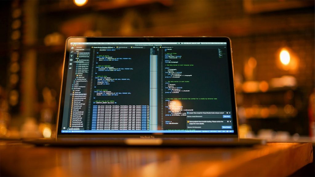 open laptop with code